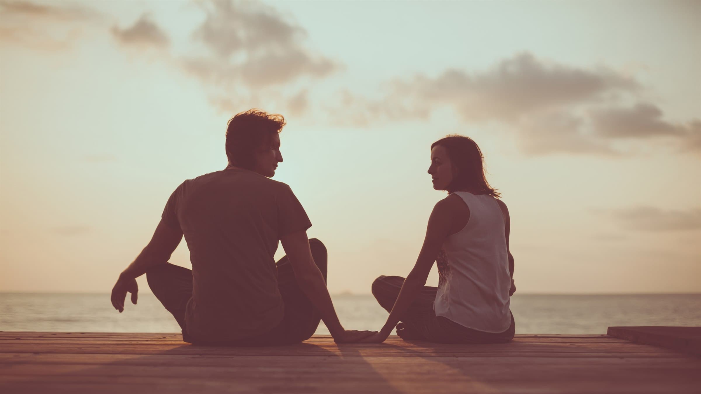Couple sitting together during a supportive couples therapy session